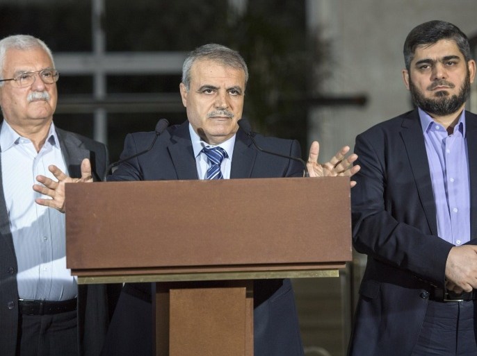 George Sabra, left, Syrian opposition Deputy Head of High Negotiations Committee (HNC), Asaad Al-Zoubi, center, head of the Syrian opposition delegation of High Negotiations Committee (HNC) and Mohamed Alloush, of the Jaysh al Islam and member of the delegation of the High Negotiations Committee (HNC), speak to the media after a new round of negotiations between the Syrian opposition and UN Special Envoy of the Secretary-General for Syria Staffan de Mistura (no pictured), at the European headquarters of the United Nations in Geneva, Switzerland, Wednesday, April 13, 2016. (Martial Trezzini/Keystone via AP)