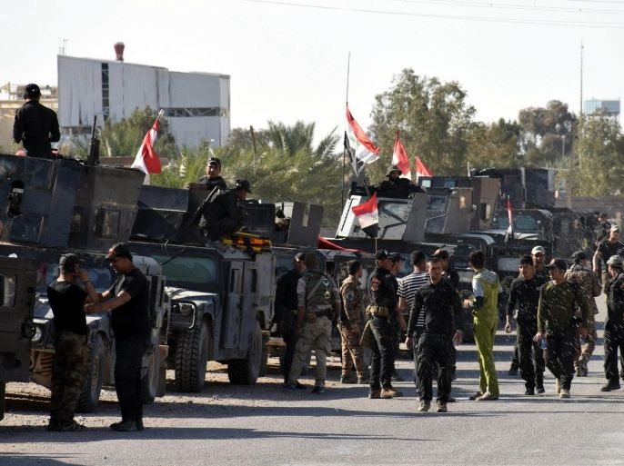 A picture made available on 19 March 2016, shows Iraqi military vehicles and troops advancing towards the centre of Al Muhammadi district, west of Ramadi city, western Iraq, 18 March 2016. Iraqi forces said on 09 February 2016, they had recaptured the Al Muhammadi zone near Heet city, west of Ramadi city although some fighting continues near Kubaisa city near the Iraqi borders with Jordan. The Iraqi government announced the 'liberation' of Ramadi from Islamic State, marking the first major setback for the al-Qaeda breakaway group since April 2015.