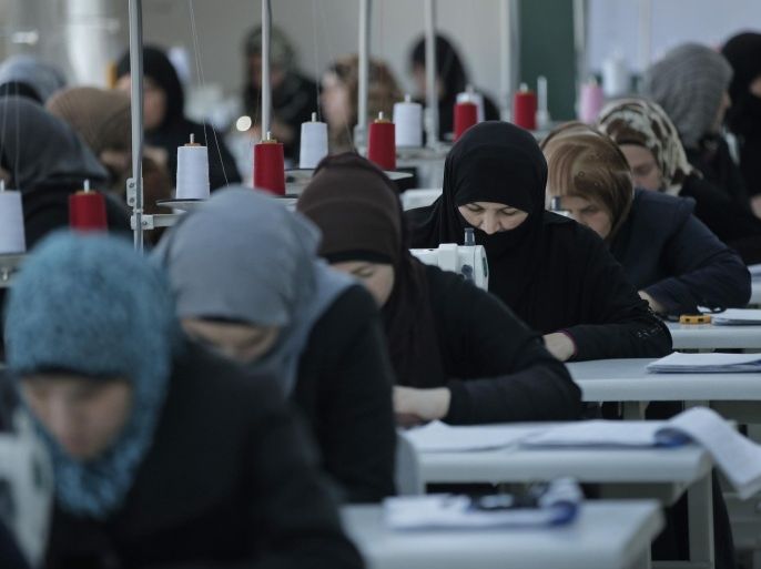 Syrian refugee women train during a sewing workshop at the Oncupinar refugee camp for Syrian refugees next to the border crossing with Syria, near the town of Kilis in southeastern Turkey, Thursday, March 17, 2016. Nearly 300,000 are housed in 26 government-run camps similar to this one. The European Union and Turkey hope to reach a comprehensive deal this week to tackle illegal migration and the refugee crisis spurred by conflicts in Syria and beyond. In return for its efforts, Turkey stands to gain 3.3 billion US dollars in EU funding to help it improve the situation of the 2.7 million Syrian refugees already within its borders. (AP Photo/Lefteris Pitarakis)