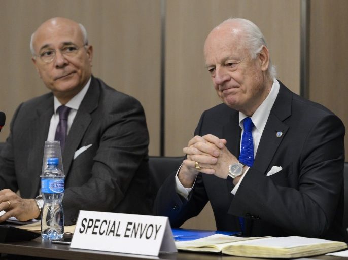 UN Syria envoy Staffan de Mistura, right, and his deputy Ramzy Ezzeldin Ramzy are seen during the opening of a meeting with UN Syria Envoy during Syria peace talks at the United Nations Office on Friday, April 22, 2016 in Geneva, Switzerland.