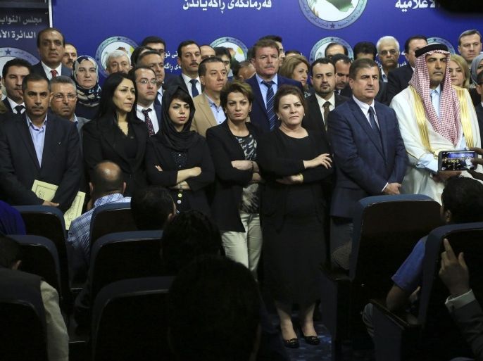 Iraqi lawmakers who attempted to oust the speaker of parliament gather during a news conference, in Baghdad, Iraq, Thursday, April 14, 2016. This comes amid a political crisis roiling the house where dozens of legislators have been holding a sit-in protest for the third consecutive day. The move followed calls for all of the country's top political leadership to step down, including the Prime Minister. (AP Photo/Karim Kadim)