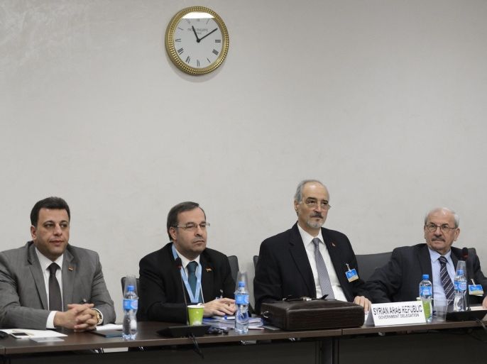 Members of the Syrian government delegation, with Syrian ambassador to the United Nations and head of the government delegation Bashar al-Jaafari, second right, are seen during the opening of a meeting with UN Syria Envoy during Syria peace talks at the United Nations Office on Friday, April 22, 2016 in Geneva, Switzerland.