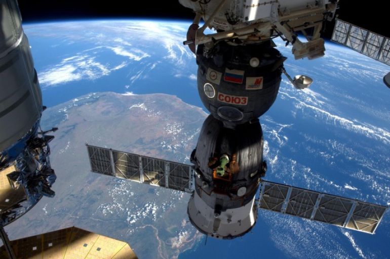 A handout picture made available by NASA on 09 April 2016 shows a view of the International Space Station (ISS) flying over Madagascar, 06 April 2016, showing three of the five spacecraft currently docked to the station. The ISS crew is waiting for the SpaceX Dragon cargo spacecraft, which will be the sixth spacecraft docked following its arrival and installation to the Harmony module on 10 April. Dragon will bring supplies and hardware as well as the Bigelow Expandable Activity Module (BEAM). The BEAM will be attached to the Tranquility module for a series of habitability tests over two years. EPA/ESA/NASA/TIM PEAKE