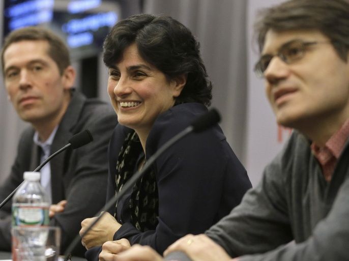 Massachusetts Institute of Technology astrophysics professor Nergis Mavalvala, center, takes questions from members of the media as MIT physics professor Matthew Evans, left, and MIT research scientist Erik Katsavounidis, right, look on during a presentation on the discovery of gravitational waves, Thursday, Feb. 11, 2016, on the school's campus, in Cambridge, Mass. In a blockbuster announcement, scientists said after decades of trying they have finally detected faint ripples of gravity reverberating invisibly through the fabric of both space and time, just as Einstein predicted. (AP Photo/Steven Senne)