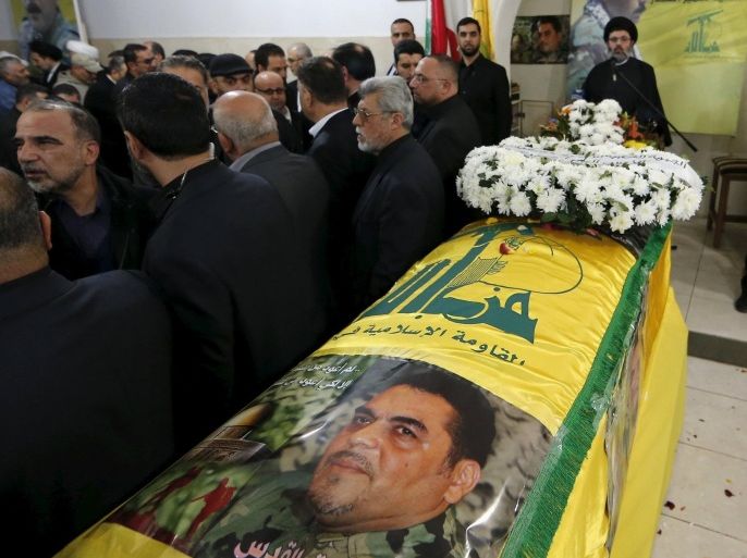 People offer their condolences near the coffin of Lebanese Hezbollah militant leader Samir Qantar during his funeral in Beirut's southern suburbs, Lebanon December 21, 2015. An Israeli air strike killed Samir Qantar, a Hezbollah militant leader, in Damascus on Saturday evening, the Lebanese group and Syrian state media said on Sunday. REUTERS/Jamal Saidi