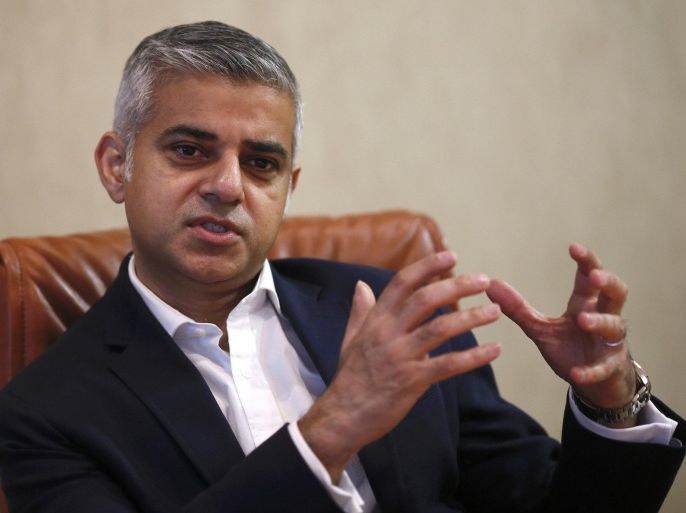 London mayoral candidate Sadiq Khan gestures during an interview with Reuters at Canary Wharf in London, Britain November 17, 2015. REUTERS/Stefan Wermuth/Files