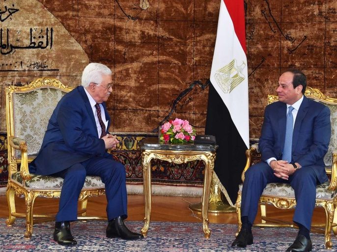 A handout photograph made available by the Egyptian Presidency shows Egyptian President Abdel Fattah al-Sisi (R) meeting with Palestinian President Mahmoud Abbas (L) in Cairo, Egypt, 09 May 2016. EPA/EGYPTIAN PRESIDENCY/HANDOUT