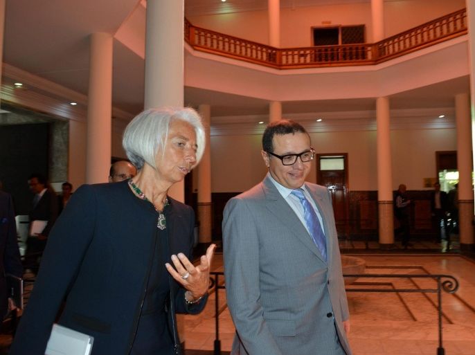 Moroccan Minister of Finance Mohamed Boussaid (R), walks with International Monetary Fund (IMF) Managing Director Christine Lagarde (L) before a meeting in the Ministry of Finance in Rabat, Morocco, 08 May 2014. Lagarde arrived in Morocco on 07 May for a three-day visit during which she will meet with senior officials. The IMF said in a statement that her visit âwill also be an opportunity to address the Economic, Social and Environmental Council and to engage with ot
