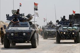 Iraqi federal police advance towards Falluja, Iraq, May 24, 2016. REUTERS/Thaier Al-Sudani