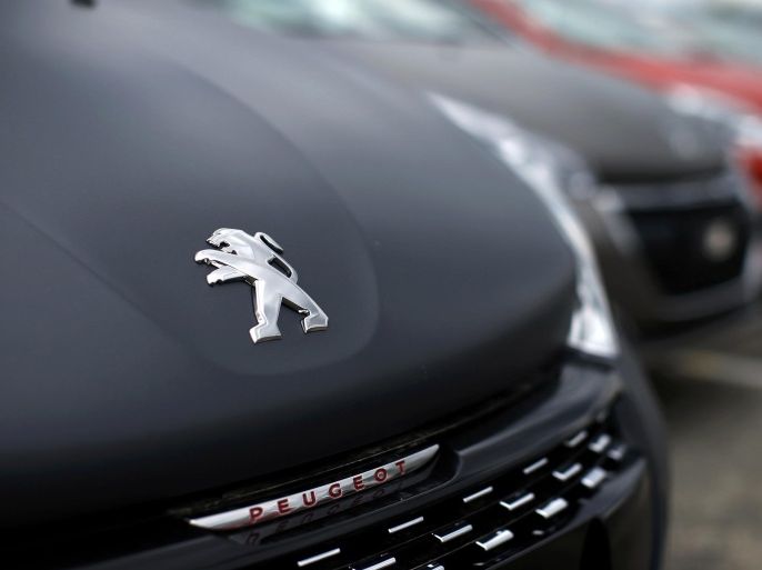 Peugeot 208 cars are parked at the PSA Peugeot Citroen plant in Poissy, near Paris, France, April 29, 2015. REUTERS/Benoit Tessier/File Photo