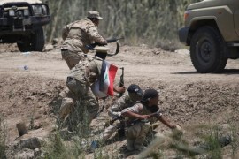 Iraqi security forces clash with Islamic State militants near Falluja, Iraq, May 25, 2016. REUTERS/Thaier Al-Sudani