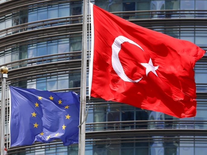 European Union (L) and Turkish flags fly outside a hotel in Istanbul, Turkey May 4, 2016. REUTERS/Murad Sezer