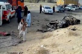 A frame grab from a video made available on 22 May 2016 shows people gather next to an ambulance at the alleged scene of a drone strike site that killed Taliban's supreme leader Mullah Akhtar Mansoor, in the Ahmad Wal area of Balochistan in Pakistan. Dawlat Waziri, Afgan Defense Ministry spokesman confirmed to the reporters that Taliban's supreme leader Mullah Akhtar Mansoor was killed in Balochistan province of Pakistan. Mullah Akhtar Mansoor took over the command of Taliban after the reports of Taliban's supreme leader Mullah Omar's death.