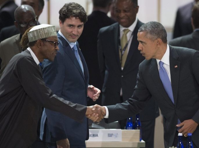 US President Barack Obama (R) shakes hands with President of Nigeria Muhammadu Buhari (L), as Prime Minister of Canada Justin Trudeau (C) looks on, at the closing plenary session of the 2016 Nuclear Security Summit at the Washington Convention Center in Washington, DC, USA, 01 April 2016. US President Barack Obama is hosting world leaders in the wake of the Belgian attacks and new intelligence on terrorist knowledge of nuclear facilities and security lapses.