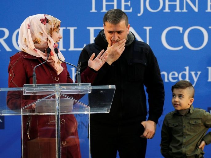 Fatema (L), her husband Abdullah (2nd L), and their five-year-old son Ayham (2nd R), a Syrian refugee family resettled in Connecticut, speak during the annual Profile in Courage Awards ceremony at the John F. Kennedy Presidential Library in Boston, Massachusetts May 1, 2016. REUTERS/Brian Snyder