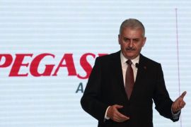 Turkey's Transportation Minister Binali Yildirim speaks before a signing ceremony in Istanbul December 18, 2012. Turkey's Pegasus Airlines said on Tuesday it would finance its order of 75 Airbus medium-haul planes through Exim banks in Airbus shareholder countries. The Istanbul-based budget carrier earlier placed a firm order for 58 fuel-saving A320neo aircraft and 17 A321neo jets, which have a combined list price of $7.5 billion. The deal also includes options for a further 25 aircraft. REUTERS/Osman Orsal (TURKEY - Tags: TRANSPORT BUSINESS POLITICS)