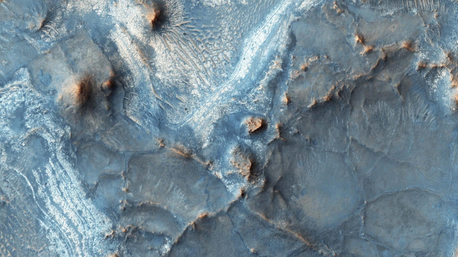 ‪منطقة نيلي فوساي إحدى المناطق الشهيرة على سطح المريخ‬ منطقة نيلي فوساي إحدى المناطق الشهيرة على سطح المريخ (رويترز)