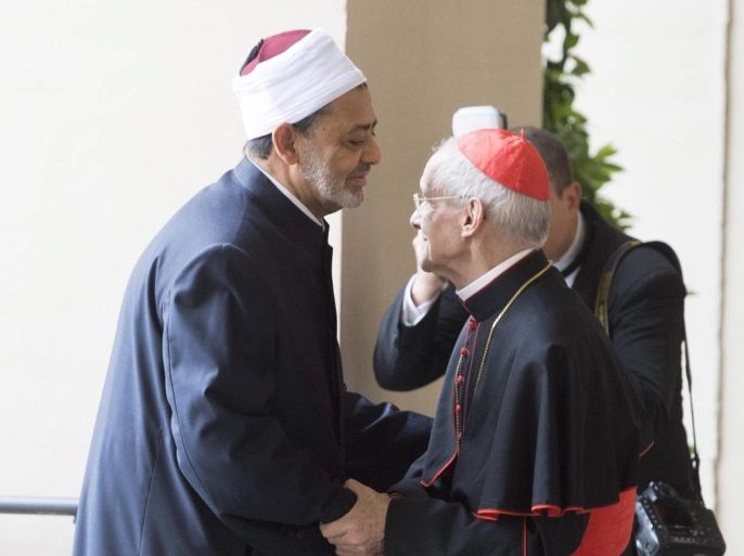 Cardinal Jean-Louis Tauran (R) welcomes Ahmad Al-Tayyib (L), the Grand Imam of the Al-Azhar Mosque, for their meeting with Pope Francis (unseen) at the Vatican, Vatican City, 23 May 2016.