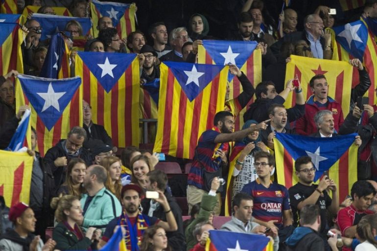 FC Barcelona's supporters hold pro-Catalan independence flags during the UEFA Champions League match between FC Barcelona and FC Bate Borisov at Camp Nou stadium in Barcelona, Catalonia, Spain, 04 November 2015.