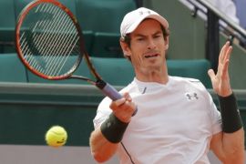 Tennis - French Open - Roland Garros - Ivo Karlovic of Croatia v Andy Murray of Britain - Paris, France - 27/05/16. Murray returns a shot. REUTERS/Jacky Naegelen
