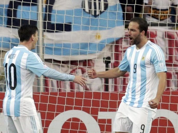 Argentina's Gonzalo Higuain (R) celebrates with teammate Lionel Messi after scoring against Jamaica during their first round Copa America 2015 soccer match at Estadio Sausalito in Vina del Mar, Chile, June 20, 2015. REUTERS/David Mercado