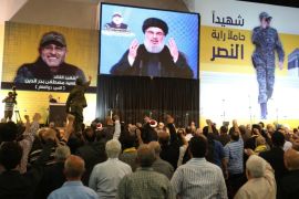 Lebanon's Hezbollah leader Sayyed Hassan Nasrallah addresses his supporters from a screen in Beirut's southern suburbs, Lebanon May 20, 2016. REUTERS/Aziz Taher