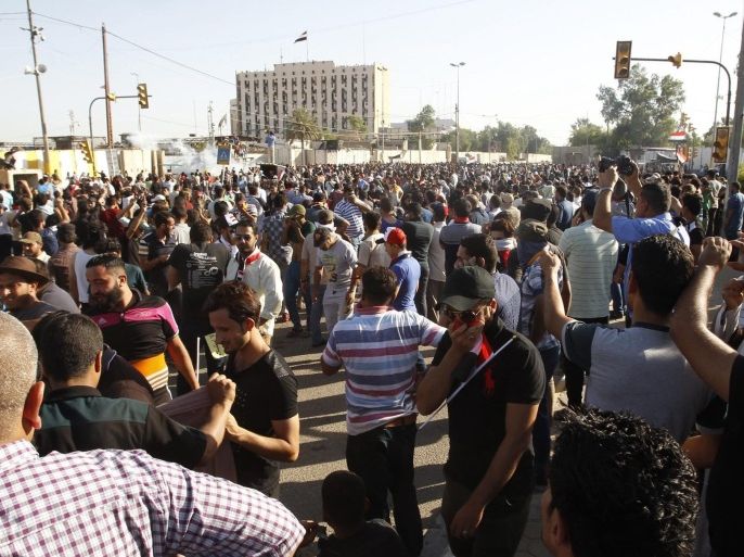 Supporters of Iraqi Shiite cleric Muqtada Al-sadr gather to the Green Zone in central Baghdad, Iraq, 20 May 2016. Protesters loyal to popular Shiite cleric Muqtada al-Sadr breached the heavily fortified Green Zone for the second time, home to government buildings and foreign embassies in Baghdad. One protester was killed and dozens others were wounded when Iraqi Security forces fired tear gas and live bullets against the protesters as the Iraqi authorities imposed the curfew will remain in place until further notice.