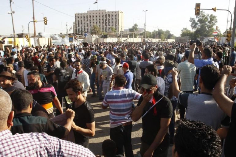 Supporters of Iraqi Shiite cleric Muqtada Al-sadr gather to the Green Zone in central Baghdad, Iraq, 20 May 2016. Protesters loyal to popular Shiite cleric Muqtada al-Sadr breached the heavily fortified Green Zone for the second time, home to government buildings and foreign embassies in Baghdad. One protester was killed and dozens others were wounded when Iraqi Security forces fired tear gas and live bullets against the protesters as the Iraqi authorities imposed the curfew will remain in place until further notice.