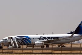 A Boeing 737-866 plane of Egypt's state-owned carrier, EgyptAir, sitting on a runway at Cairo Airport, Cairo, Egypt. 19 May 2016. According to media reports quoting Egyptair on 19 May 2016, EgyptAir Airbus A320 Flight MS804 disappeared off radar some 16km after entering Egypt's airspace. The plane, said to be carrying 66 people on board, 56 passengers and 10 crew members, took off from France's Charles de Gaulle airport on 18 May night and was expected to land in Cairo on 19 May early morning.