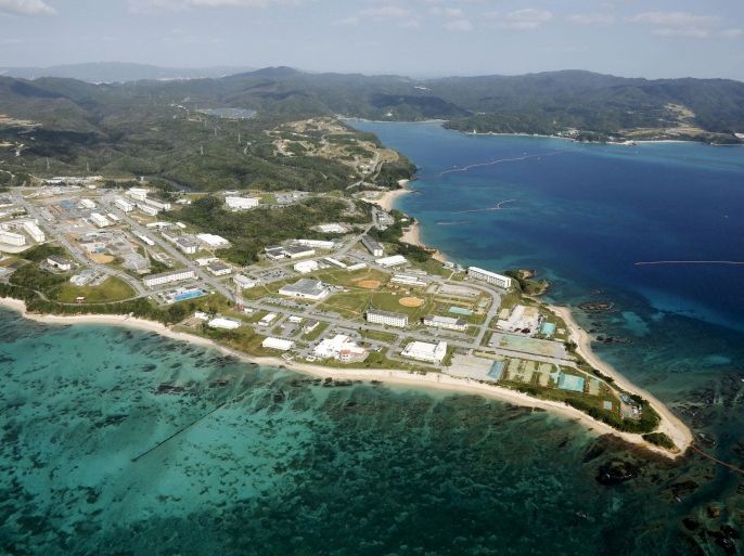 Coral reefs are seen along the coast near the U.S. Marine base Camp Schwab, off the tiny hamlet of Henoko in Nago, on the southern Japanese island of Okinawa, in this file aerial photo taken by Kyodo October 29, 2015 file photo. Mandatory credit REUTERS/Kyodo/Files ATTENTION EDITORS - THIS IMAGE HAS BEEN SUPPLIED BY A THIRD PARTY. FOR EDITORIAL USE ONLY. NOT FOR SALE FOR MARKETING OR ADVERTISING CAMPAIGNS. MANDATORY CREDIT. JAPAN OUT. NO COMMERCIAL OR EDITORIAL SALES