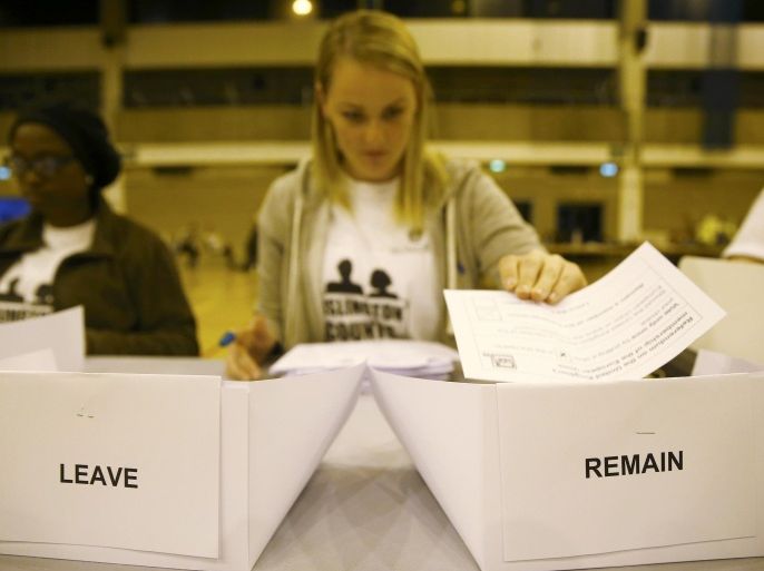 A workers counts ballots after polling stations closed in the Referendum on the European Union in Islington, London, Britain, June 23, 2016. REUTERS/Neil Hall