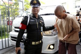 An unidentified Thai citizen, one of the eight who were detained after allegedly posting messages criticizing the Thailand's Prime Minister Prayut Chan-o-cha on Facebook, is escorted by a military police officer as he arrives to the military court for trial in Bangkok, Thailand, 10 May 2016. Human rights activists expressed growing concerns after Prayut's crackdown on pro-democracy activists with sedition and other criminal charges. Eight people were detained with sedition charges allegedly violating the Computer Crimes Act after posting messages criticizing the Thai Prime Minister on Facebook.