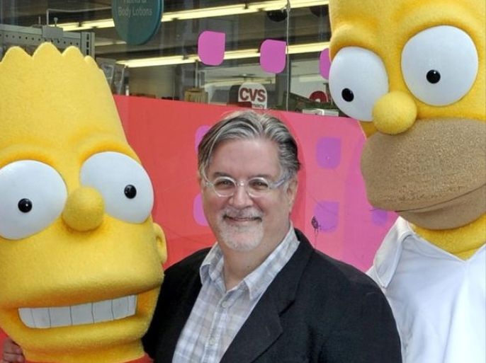 (FILE) The file picture dated 14 February 2012 shows the creator of 'The Simpsons' Matt Groening posing with US television characters Bart Simpson (L) and Homer Simpson (R) on the Hollywood Walk of Fame during the star awarding ceremony in Hollywood, California, USA. Groening turns 60 on 15 February 2014.