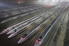 CRH380 (China Railway High-speed) Harmony bullet trains are seen at a high-speed train maintenance base in Wuhan, Hubei province, in this December 25, 2012 file photo. Thirty-five construction companies, financiers, train manufacturers and operators from around the world have expressed interest in working on California's $68 billion high-speed train.REUTERS/Stringer CHINA OUT. NO COMMERCIAL OR EDITORIAL SALES IN CHINA
