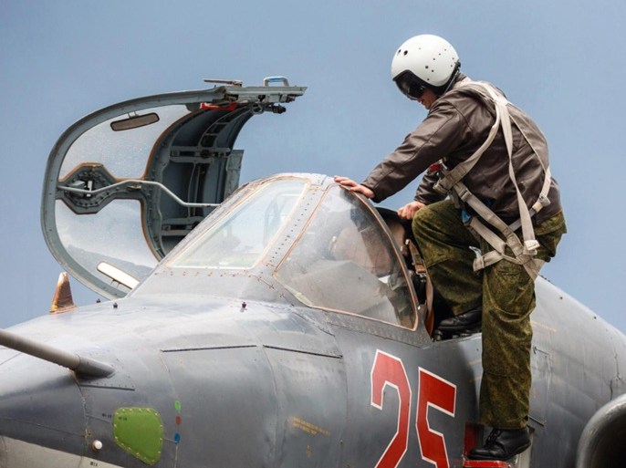 A handout picture made available on the official website of the Russian Defence Ministry shows Russian pilot getting inside a SU-25 strike fighter before the take-off at the Syrian Hmeymim airbase, outside Latakia, Syria, 16 March 2016. Russian warplanes leave the Hmeymim airbase for permanent location airfields in Russia following the order of Russian President Vladimir Putin to withdraw the majority of Russian troops from Syria.