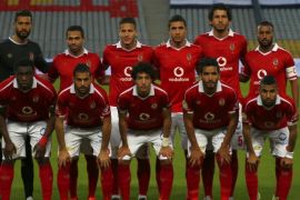Al Ahly players pose for pictures before their Egyptian Premier League soccer match against Al Masry at Borg El Arab "Army Stadium", west of the Mediterranean city of Alexandria, Egypt, February 23, 2016. The match will played without spectators due to security reasons. REUTERS/Amr Abdallah Dalsh