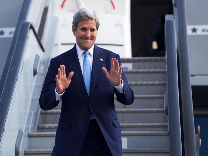 U.S. Secretary of State John Kerry waves as he steps off his plane after arriving at Kastrup International Airport, Thursday, June 16, 2016, in Copenhagen. REUTERS/Evan Vucci/Pool