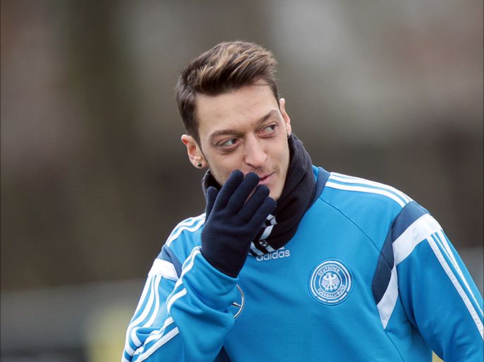 epa04681565 Germany's Mesut Oezil during the final training session of the German national soccer team in Frankfurt, Germany, 27 March 2015. The German team is preparing for the upcoming UEFA EURO 2016 qualification match on 29 March against Georgia. EPA/FREDRIK VON ERICHSEN
