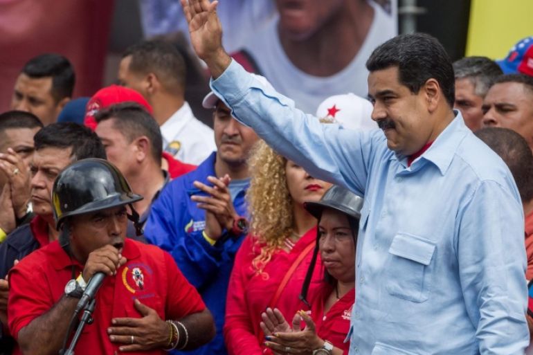 President of Venezuela, Nicolas Maduro (R), participates in a demonstration of a group of people, public officials and supporters, in Caracas, Venezuela, 31 May 2016. Organization of American States head Luis Almagro on 31 May invoked the body's Democratic Charter against Venezuela, an unprecedented step that could lead to the country's suspension from the OAS. With this step a process of meetings and votes is initiated that could lead to resolutions and diplomatic moves for the eventual suspension of Venezuela from membership in the organization, which would require a two-thirds majority of the foreign ministers, something that has only occurred once, after the coup d'etat in Honduras in 2009.