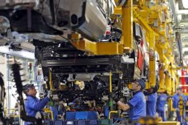 A staff member works at the Ford assembly plant in Almussafes, in the province of Valencia, eastern Spain, 05 February 2015. Ford's plant in Almussafes will rise its production to 400,000 vehicles in 2015, a 40 percent more in comparison to the previous year, Ford's President and CEO Fields announced during a visit to the automobile manufacturer's facilities in Valencia.
