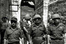 Retired General Uzi Narkiss (L) is seen in this file photo, taken in June 1967 at the end of the "Six Day War", entering Jerusalem's Old City via the Lion's Gate with then Defense Minister Moshe Dayan (C) and then Chief of Staff Yitzhak Rabin (R). To match Special Report ISRAEL-JERUSALEM/DOME REUTERS/GPO/Ilan Bruner/Handout via Reuters ATTENTION EDITORS - THIS IMAGE WAS PROVIDED BY A THIRD PARTY. ISRAEL OUT. NO COMMERCIAL OR EDITORIAL SALES IN ISRAEL. FOR EDI