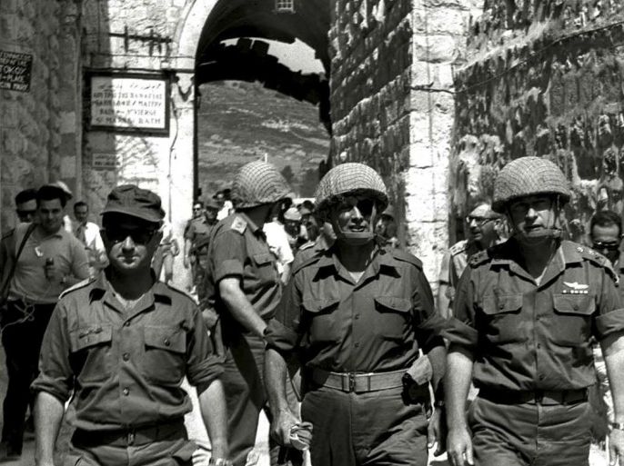 Retired General Uzi Narkiss (L) is seen in this file photo, taken in June 1967 at the end of the "Six Day War", entering Jerusalem's Old City via the Lion's Gate with then Defense Minister Moshe Dayan (C) and then Chief of Staff Yitzhak Rabin (R). To match Special Report ISRAEL-JERUSALEM/DOME REUTERS/GPO/Ilan Bruner/Handout via Reuters ATTENTION EDITORS - THIS IMAGE WAS PROVIDED BY A THIRD PARTY. ISRAEL OUT. NO COMMERCIAL OR EDITORIAL SALES IN ISRAEL. FOR EDI