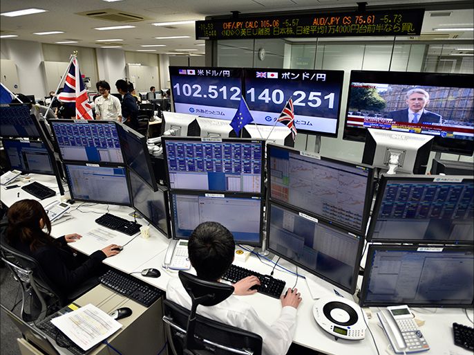 epa05387320 Monitors display the current exchange rate of the Japanese yen against the US dollar (L) and the British Pound (C) as traders work at a foreign exchange brokerage in Tokyo, Japan, 24 June 2016. The USD, the Euro and the British Pound fell sharply in raction to the British EU referendum. Following the 'Brexit' vote, Tokyo stocks plunged sharply to mark its largest fall in 16 years to close the week down 1,286.33 points, or 7.92 percent, at 14,952.02. Britons in a referendum on 23 June have voted by a narrow margin to leave the European Union (EU). Media reports on early 24 June indicate that 51.9 percent voted in favour of leaving the EU while 48.1 percent voted for remaining in. EPA/FRANCK ROBICHON