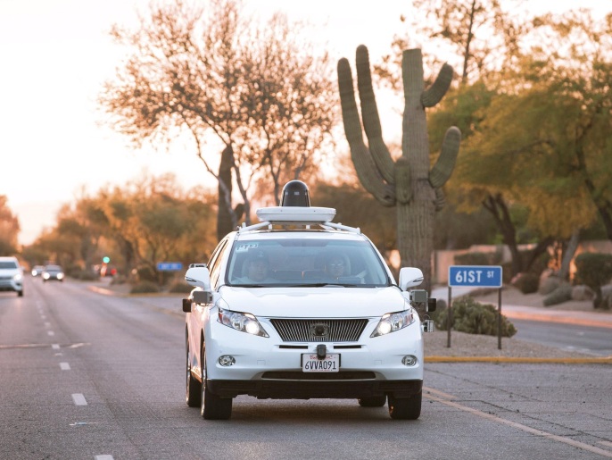 Test drivers use a Lexus SUV, built as a self-driving car, to map the area prior to a journey without a driver in control, in Phoenix, Arizona April 5, 2016 in a photo provided by Google. Alphabet Inc is expanding its testing of self-driving cars to the Phoenix, Arizona metro area, the company said on Thursday, making it the fourth U.S. city to serve as a proving ground for the autonomous vehicles. REUTERS/Google/Handout via Reuters ATTENTION EDITORS - THIS PICTU