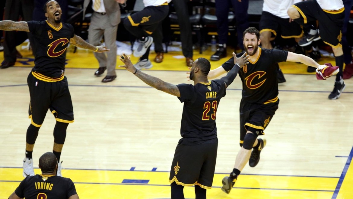 Jun 19, 2016; Oakland, CA, USA; Cleveland Cavaliers forward LeBron James (23) celebrates with Cleveland Cavaliers guard J.R. Smith (5) and Cleveland Cavaliers forward Kevin Love (0) after beating the Golden State Warriors in game seven of the NBA Finals at Oracle Arena. Mandatory Credit: Kelley L Cox-USA TODAY Sports