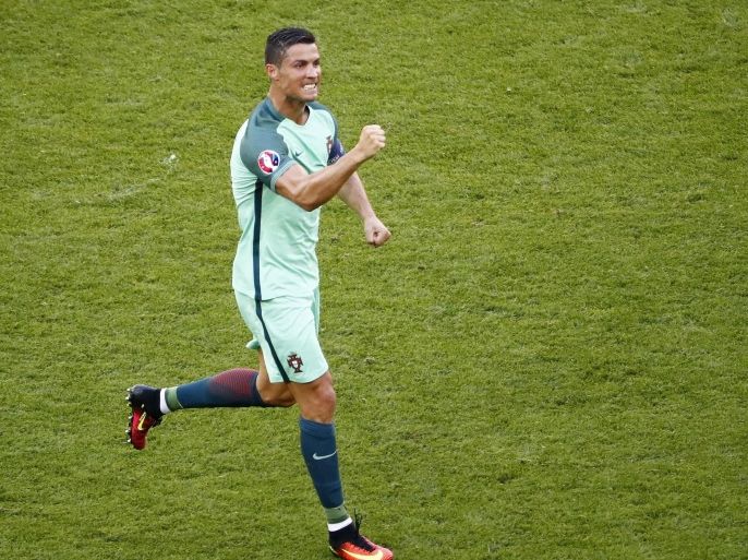 Football Soccer - Hungary v Portugal - EURO 2016 - Group F - Stade de Lyon, Lyon, France - 22/6/16 Portugal's Cristiano Ronaldo celebrates after scoring their third goal REUTERS/Max Rossi Livepic