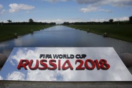 The 2018 World Cup logo is pictured near the Konstantin (Konstantinovsky) Palace, the venue of the preliminary draw for the 2018 World Cup, in St. Petersburg, July 24, 2015. The 2018 World Cup's preliminary draw will be held in St. Petersburg on July 25. REUTERS/Maxim Shemetov
