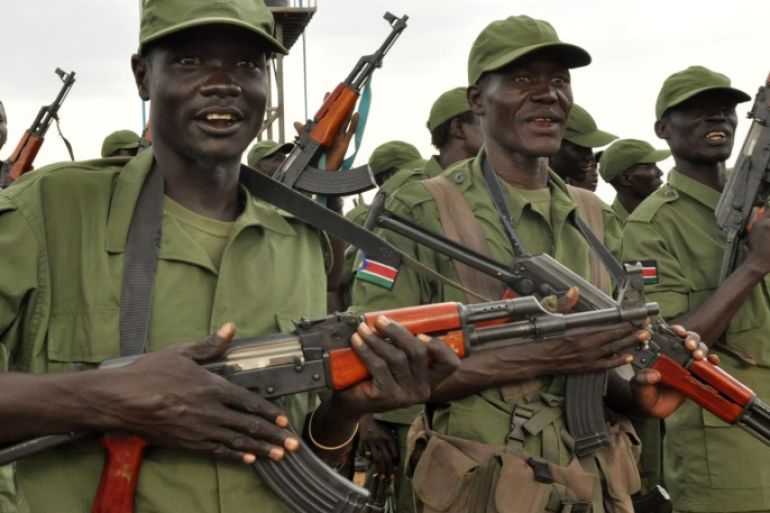 Members of the SPLM/A-In Opposition (IO) forces allied with South Sudan's former rebel leader Riek Machar gather outside capital Juba, April 7, 2016. REUTERS/Jok Solomun