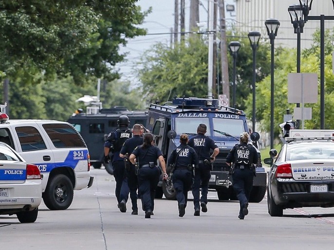 Heavily-armed Dallas Police Department officers investigate a 'credible threat' at the department's headquarters in Dallas, Texas, USA, 09 July 2016. Five officers died and seven were injured after an ambush assault by a gunman during a protest rally in Dallas on 07 July.