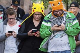 (FILE) A file picture dated 11 July 2016 shows people playing the new game 'Pokemon Go' on their smartphone in Leerdam, The Netherlands. According to reports, shares of Japanese multinational consumer electronics and software company Nintendo soared by 16 percent at the Tokyo Stock Exchange on 14 July 2016, given to the success of its new smartphone game 'Pokemon Go.' The shares of the company, which is headquartered in Kyoto, Japan, reached 244 US dollar during the first half of the trading day at the Tokyo exchange, media added. Pokemon Go, a Global Positioning System (GPS) based augmented reality mobile game, launched first on 06 July in the US.